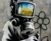 Banksy gas mask via Banksy on Facebook